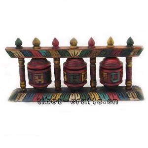 wooden sculpture prayer wheels