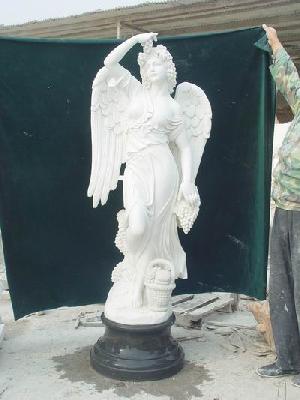 white marble ladies angele statue