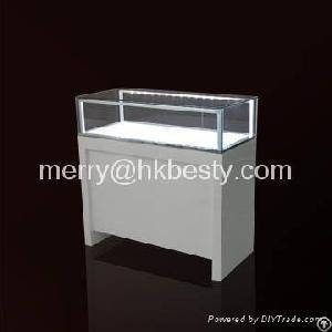 display counter colour glossy wood silver jewelry