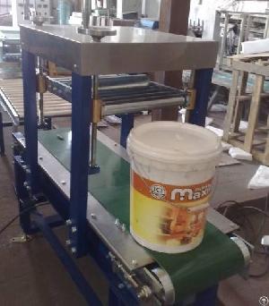 lid press machine