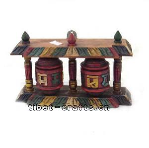 wooden sculpture prayer wheels