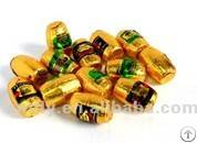 barrel shaped foil wrapped milk chocolate candy