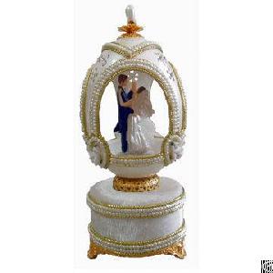 faberge goose egg music box movement figurine