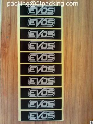 Silver Evos Labels In Black Background