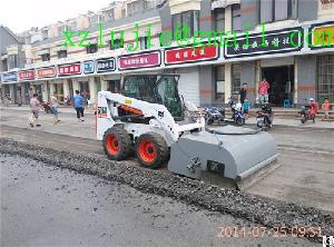 skid loader road sweeper