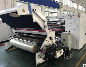 four shaft exchange adhesive tape cutting machine