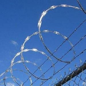 Flat Wrap Razor Wires And Barbed Wires Are Installed At The Top Of Chain Link Fencing