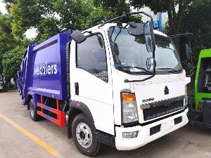 sinotruk howo 8cbm rhd garbage compactor truck