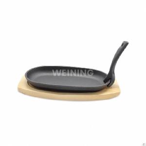 oval shape cast iron steak plate sizzle griddle wooden base
