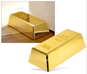 A Gold Bar Door Stop