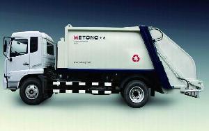 refuse compactor garbage compressing truck