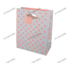 Grey Bag With Red Dot Cut Out Paper Bag