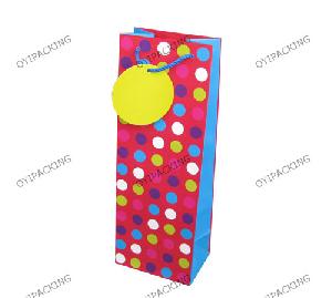 pink blue green dot bottle paper bag